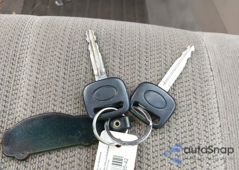 2002 Toyota Corolla Ce z USA, uszkodzony, nr VIN 1NXBR12E72Z652070